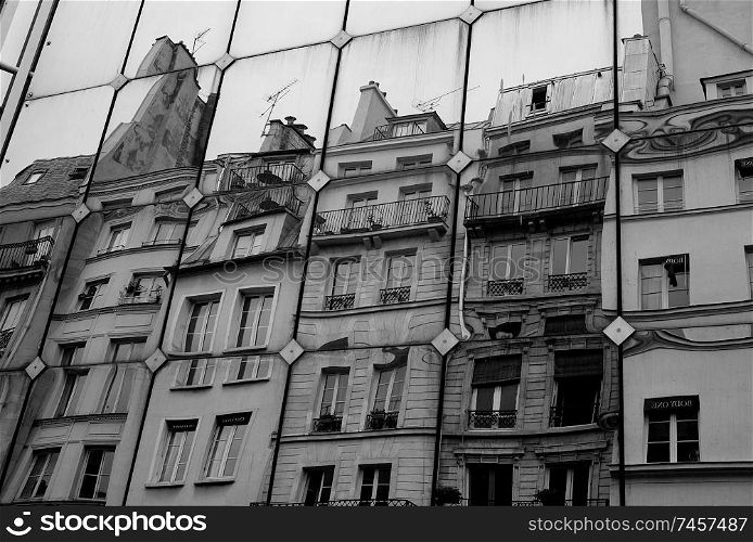 Reflection of buildings in Paris France