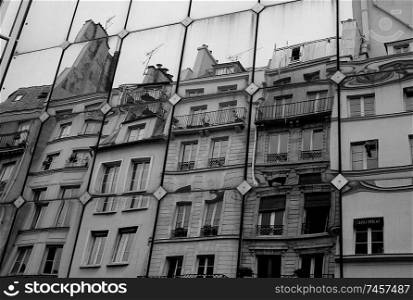Reflection of buildings in Paris France