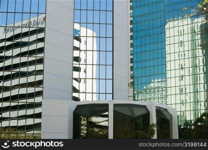 Reflection of buildings on glass, Miami, Florida, USA