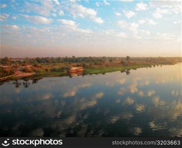 Reflection of cloud on water, Nile River, Egypt