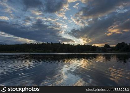 Reflection of clouds in a lake, Lake of the Woods, Ontario, Canada