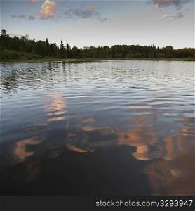 Reflection of clouds on the water at Lake of the Woods, Ontario