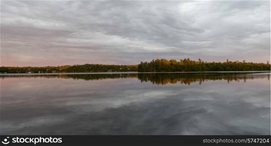 Reflection of clouds on water, Lake of The Woods, Ontario, Canada
