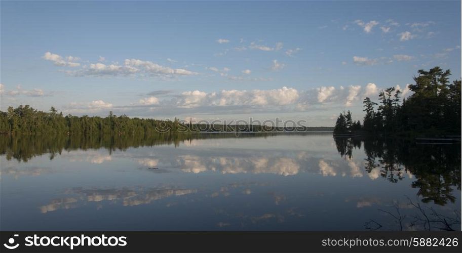 Reflection of clouds on water, Lake Of The Woods, Ontario, Canada