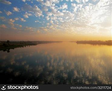 Reflection of clouds on water, Nile River, Egypt