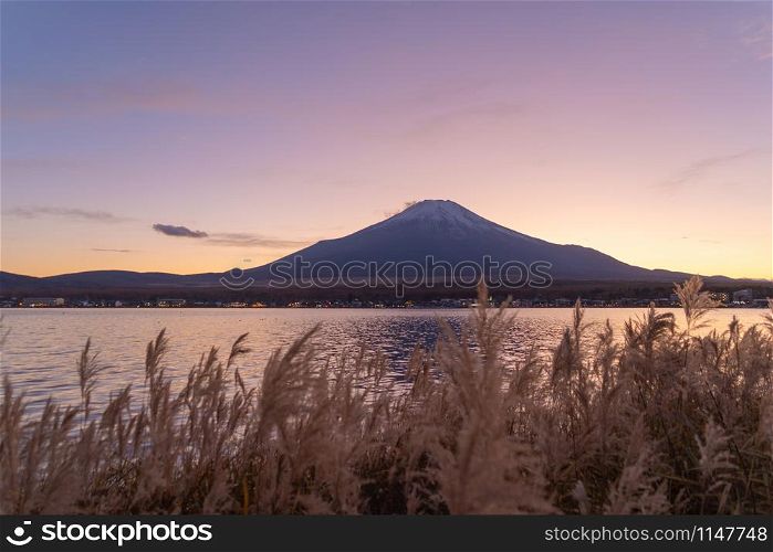Reflection of Mountain Fuji with blue sky near Fuji Five Lakes, Fujikawaguchiko, Yamanashi, Japan. Nature landscape background.