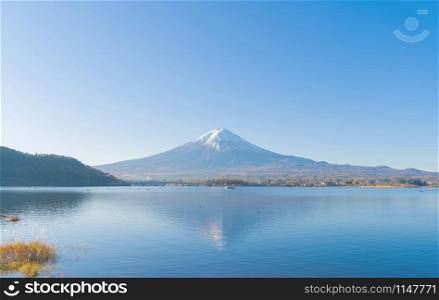 Reflection of Mountain Fuji with blue sky near Fuji Five Lakes, Fujikawaguchiko, Yamanashi, Japan. Nature landscape background.