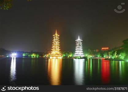 Reflection of pagodas in water, Guilin, China