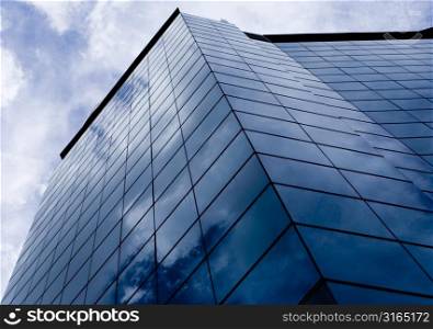 Reflection of sky on the glassfront of an office building, Singapore