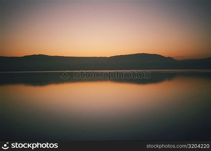 Reflection of the sky and mountains in the sea, Dead Sea, Israel