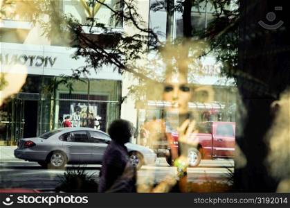 Reflection of the street on a store window, Magnificent Mile, Chicago, Illinois, USA