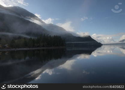 Reflection of trees in water, Furry Creek, British Columbia, Canada