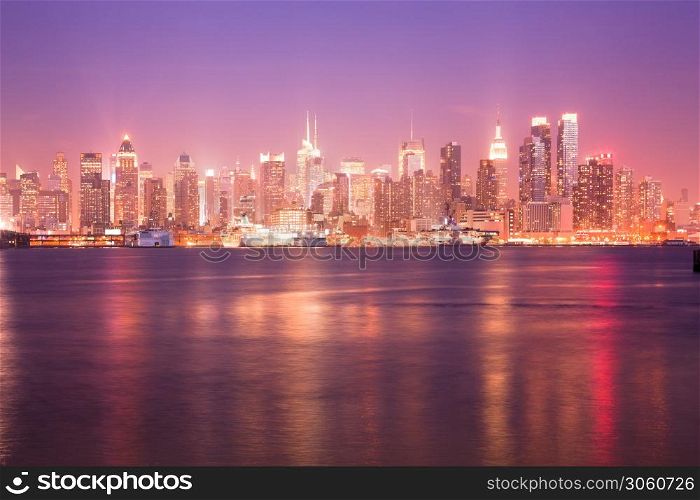 Reflection over the Hudson River and Skyline of midtown Manhattan, New York City, NY, USA