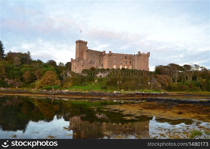 Reflections of Dunvegan Castle on the Isle of Skye in Scotland.