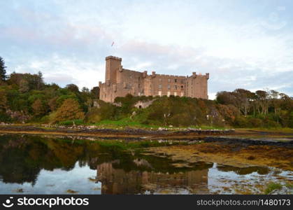 Reflections of Dunvegan Castle on the Isle of Skye in Scotland.