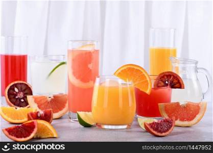 Refreshing fresh detox citrus juices from orange, sicilian orange, grapefruit, lime