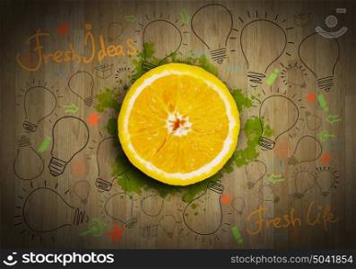 Refreshing juice. Half of fresh orange on white background