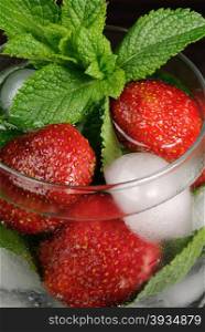 Refreshing summer drink with Strawberry and mint in glasses