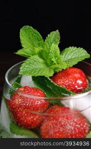 Refreshing summer drink with Strawberry and mint in glasses