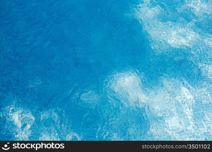 Refreshing water of swimming pool in summer