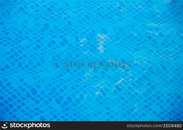 Refreshing water of swimming pool in summer
