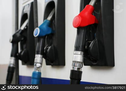 Refueling hose at modern petrol filling station