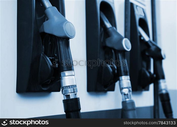 Refueling hose at modern petrol filling station