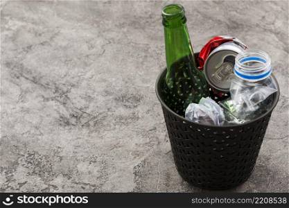 refuse bin with trash grey surface