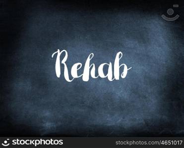Rehab written on a blackboard