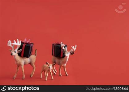 reindeer toys with gift boxes . Resolution and high quality beautiful photo. reindeer toys with gift boxes . High quality and resolution beautiful photo concept