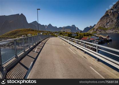 Reine bridge Lofoten is an archipelago in the county of Nordland, Norway. Is known for a distinctive scenery with dramatic mountains and peaks, open sea and sheltered bays, beaches and untouched lands