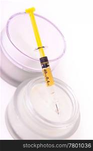rejuvenating botox cream with syringe isolated