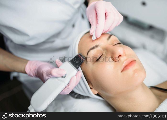 Rejuvenation procedure, getting rid of wrinkles, cosmetology clinic. Facial skincare in spa salon. Rejuvenation procedure, getting rid of wrinkles