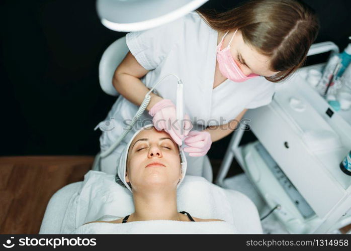 Rejuvenation procedure, getting rid of wrinkles, cosmetology clinic. Facial skincare in spa salon, health care. Rejuvenation procedure, getting rid of wrinkles