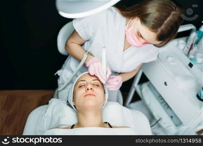 Rejuvenation procedure, getting rid of wrinkles, cosmetology clinic. Facial skincare in spa salon, health care. Rejuvenation procedure, getting rid of wrinkles