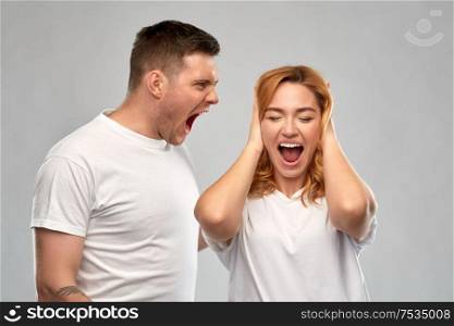 relationship difficulties, conflict and emotions concept - unhappy couple having argument. unhappy couple having argument