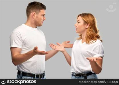 relationship difficulties, conflict and emotions concept - unhappy couple having argument. unhappy couple having argument