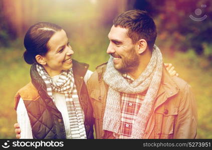 relationships and people concept - happy couple hugging outdoors. happy couple hugging outdoors
