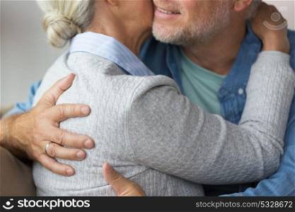 relationships, marriage and old people concept - close up of married senior couple hugging. close up of married senior couple hugging