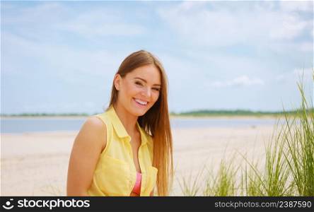 Relax and leisure. Young woman resting on summer beach. Pretty girl sunbathing on fresh air in summer.. Woman resting on beach.
