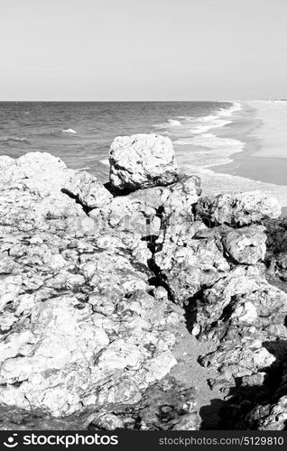 relax near sky in oman coastline sea ocean gulf rock and beach