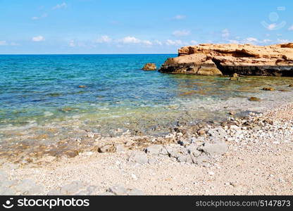 relax near sky in oman coastline sea ocean gulf rock and beach