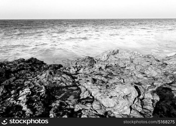 relax near sky in oman coastline sea ocean gulf rock and beach