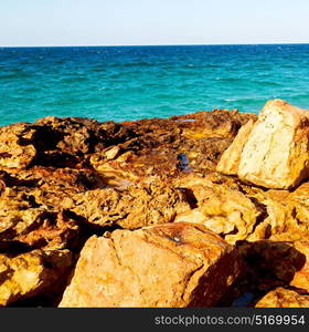 relax near sky in oman coastline sea ocean gulf rock and beach