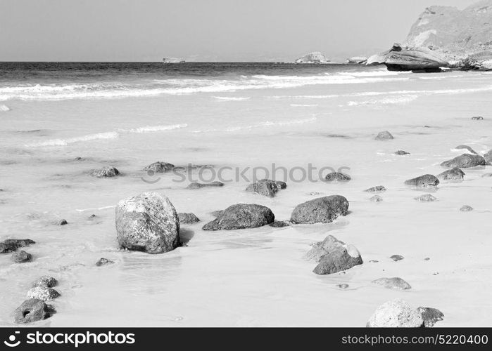 relax near sky in oman coastline sea ocean gulf rock and beach