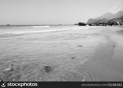 relax near sky in oman coastline sea ocean gulf rock and beach