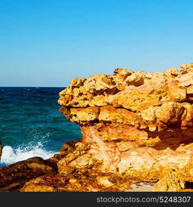 relax near sky in oman coastline sea ocean gulf rock and beach