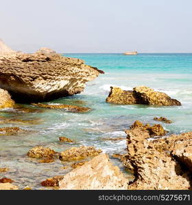 relax near sky in oman coastline sea ocean gulf rock and beach