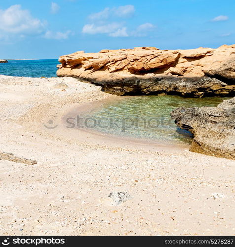 relax near sky in oman coastline sea ocean gulf rock and beach