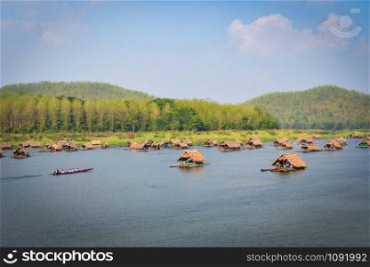 Relax travel river / Landscape of lake sky mountain and bamboo houseboat raft floating air fresh bright day at HuayKraTing landmark of Loei Thailand